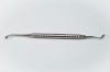 Graft packer with spoon